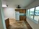 Functional kitchen with modern appliances, granite countertops, and abundant natural light from a large window at 300 Dalton Blvd Blvd, Port Charlotte, FL 33952