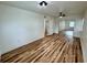 Spacious main bedroom featuring hardwood floors, ample closet space, and a well-lit atmosphere at 300 Dalton Blvd Blvd, Port Charlotte, FL 33952