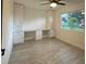Bedroom with built in storage and view of yard at 4300 Avanti Cir, North Port, FL 34287