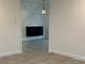 Stylish dining area featuring wood-look tile floors, unique starburst light, and accent cabinet at 4300 Avanti Cir, North Port, FL 34287