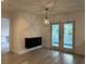 Modern dining area with elegant starburst pendant lighting and glass doors to patio at 4300 Avanti Cir, North Port, FL 34287