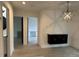 Hallway featuring accent wall decor and leading to kitchen and bathroom at 4300 Avanti Cir, North Port, FL 34287