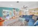 Cozy living room with bright accents, an airy atmosphere, and an open layout at 7453 Spinnaker Blvd, Englewood, FL 34224