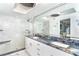 Modern bathroom featuring granite countertops, a glass shower, and stylish fixtures at 7500 Palm Island S Dr # 2111, Placida, FL 33946