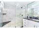 Bright bathroom with glass shower, granite countertops, and modern fixtures at 7500 Palm Island S Dr # 2111, Placida, FL 33946
