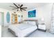 Relaxing bedroom with a coastal vibe, turtle decor, and natural light at 7500 Palm Island S Dr # 2111, Placida, FL 33946