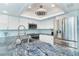 Modern kitchen boasting stainless steel appliances, white cabinetry, and granite counters at 7500 Palm Island S Dr # 2111, Placida, FL 33946