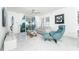 Comfortable living room with water view and access to balcony at 7500 Palm Island S Dr # 2111, Placida, FL 33946