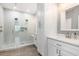 This bathroom features a glass shower stall with dual shower heads and mosaic flooring at 9151 Melody Cir, Port Charlotte, FL 33981