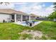 Inviting backyard pool features patio area and backyard at 9151 Melody Cir, Port Charlotte, FL 33981