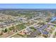 Expansive aerial view of a waterfront community with stunning canals, homes, and lush greenery at 9213 Spring Cir, Port Charlotte, FL 33981