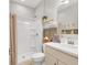 Bathroom featuring a tiled shower and modern fixtures at 9213 Spring Cir, Port Charlotte, FL 33981