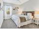 Bright bedroom with soft carpeting and natural light at 9213 Spring Cir, Port Charlotte, FL 33981