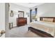 Bedroom featuring dark wood furnishings and neutral paint scheme at 9213 Spring Cir, Port Charlotte, FL 33981