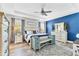The primary bedroom suite with a tray ceiling features an ensuite bathroom at 9213 Spring Cir, Port Charlotte, FL 33981