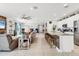 Spacious, open-concept living area with a large island, dining area, and living room at 9213 Spring Cir, Port Charlotte, FL 33981