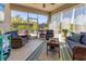 Spacious patio with outdoor seating and screened windows at 9213 Spring Cir, Port Charlotte, FL 33981