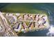 Aerial view of waterfront community with tennis courts and marina at 103 1St E St # 204, St Petersburg, FL 33715