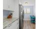 Kitchen with stainless steel appliances and granite countertops at 103 1St E St # 204, St Petersburg, FL 33715