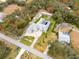 Aerial view showing house, pool, and expansive property at 17847 Dansville Dr, Spring Hill, FL 34610