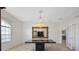 Elegant dining room with a large marble table and crystal chandelier at 17847 Dansville Dr, Spring Hill, FL 34610