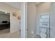 Half-bath showcasing modern fixtures, a shelf, and an over-the-toilet storage unit at 14069 Wineberry Dr, Dade City, FL 33525