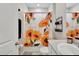 Full bathroom with shower and colorful shower curtain at 14069 Wineberry Dr, Dade City, FL 33525