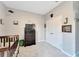 Neutral colored bedroom with dark dresser and walk in closet at 14069 Wineberry Dr, Dade City, FL 33525