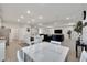 Open concept living space showcasing the kitchen, island, and living room at 14069 Wineberry Dr, Dade City, FL 33525