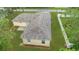 Aerial shot of the property showing a well-manicured lawn and an established landscape at 3143 Grayton Dr, Spring Hill, FL 34609