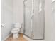 Bright bathroom with tile floors and a glass enclosed shower at 3143 Grayton Dr, Spring Hill, FL 34609