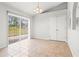 Dining room with tile floors and a sliding glass door to the backyard at 3143 Grayton Dr, Spring Hill, FL 34609