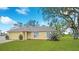 Inviting single-Gathering home with a neat front yard, offering curb appeal and a welcoming atmosphere at 3143 Grayton Dr, Spring Hill, FL 34609