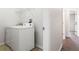 Laundry room with shelving and access to the hallway and other rooms at 3143 Grayton Dr, Spring Hill, FL 34609