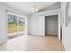 Dining room with pantry behind bi-fold doors and access to the backyard at 3143 Grayton Dr, Spring Hill, FL 34609