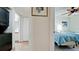 The bedroom has two twin beds with beach-themed decor and a ceiling fan at 4655 46Th Street Ct # 101, Bradenton, FL 34210