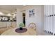 Cozy dining area with an open view to the kitchen, perfect for casual meals and entertaining guests at 4655 46Th Street Ct # 101, Bradenton, FL 34210