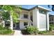 Inviting two-story condo with well-maintained landscaping and a welcoming entrance at 4655 46Th Street Ct # 101, Bradenton, FL 34210
