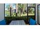 Relaxing screened lanai with a picturesque view of the pond at 4655 46Th Street Ct # 101, Bradenton, FL 34210