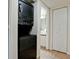 The laundry area features a stacked washer and dryer with a nearby bathroom at 4655 46Th Street Ct # 101, Bradenton, FL 34210