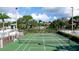 Scenic tennis court at a vibrant community offers residents an active and engaging recreational space at 4655 46Th Street Ct # 101, Bradenton, FL 34210