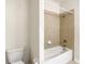 Bathroom with shower/tub combo and tile surround at 8809 49Th E Ave, Palmetto, FL 34221