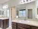 Bathroom with double vanity and large mirror at 8809 49Th E Ave, Palmetto, FL 34221