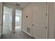 Bright hallway with access to bedrooms and ample closet space at 9141 Gulf Haven Dr, Parrish, FL 34219