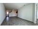 Spacious living room with gray plank tile flooring at 9141 Gulf Haven Dr, Parrish, FL 34219
