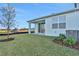 Newly built home featuring a large backyard and patio at 9136 Gulf Haven Dr, Parrish, FL 34219