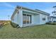 Newly constructed home with a spacious backyard and patio at 9136 Gulf Haven Dr, Parrish, FL 34219