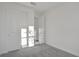 Bright bedroom with gray carpet and a walk-in closet at 9136 Gulf Haven Dr, Parrish, FL 34219