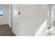 Clean hallway with tile floors and doors to other rooms at 9136 Gulf Haven Dr, Parrish, FL 34219