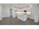 Modern kitchen with white cabinets, quartz countertops and stainless steel appliances at 9136 Gulf Haven Dr, Parrish, FL 34219